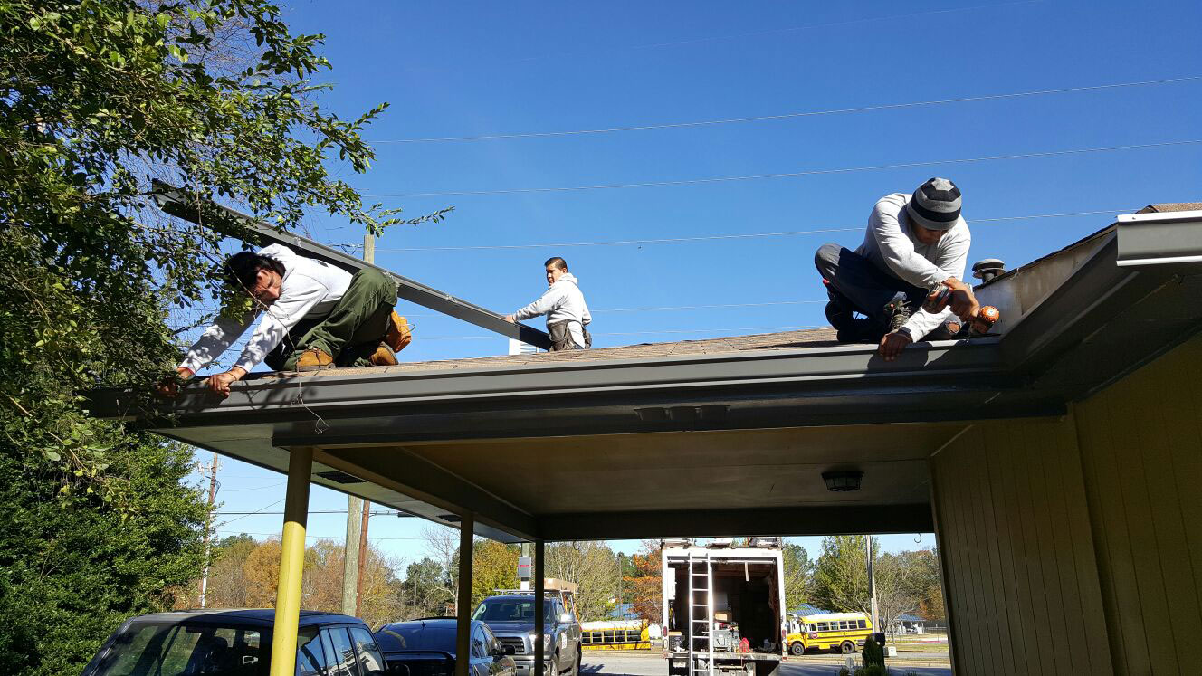 Seamless aluminum gutters installed on a home