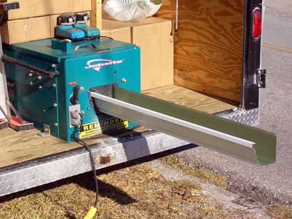 Seamless gutter machine forming gutters on-site